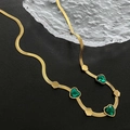 Golden emerald heart charm necklace with flat snake chain and geometric accents - Gold
