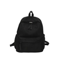 Minimalist black corduroy backpack with textured surface and woven zipper pullers - Black