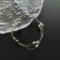 Three-layer stainless steel snake chain bracelet with olive-shaped metallic beads - Silver Bracelet (06-K13)