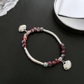 Ethno-Keramikarmband mit silbernen Schlossanhängern und rot-blauen Perlen im Vintage-Stil - Friedensschloss Perlen Stil