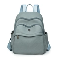 Stylish light blue-grey backpack with woven texture and multiple zipper compartments - Blue