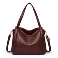 Deep burgundy pebbled leather bucket bag with gold hardware and adjustable strap - Red