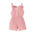 Detailed close-up of pink ribbed baby romper with shoulder bows and button details - 6-12M / Dresses / Pink