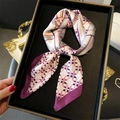 Elegant silk-like scarf featuring pink and purple chain prints tied in a bow on a tray - 70x70cm / Purple (FJ908-1)