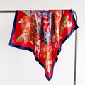 Detail of red floral satin scarf showing silky texture and blue contrast hem - 90x90cm / Navy Red (FT259-3)