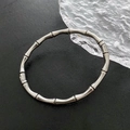 Minimalistischer silberner Bambus-Armreif aus Vintage-Edelstahl für Damen - Silber
