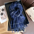 Detailed view of navy blue plaid scarf with fringes and textured fabric in premium setting - 200x68cm (Including Tassels) / Blue