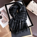 Detail of classic black and white plaid scarf with fringe on a stylish leather background - 200x68cm (Including Tassels) / Black