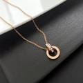 Roségoldene Kette mit römischen Ziffern und Zirkonia in verschlungenen Doppelringen - Roségold