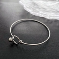 Minimalist silver stainless steel bracelet featuring a unique ball clasp closure design - Silver Ball Buckle Style (02-D3)