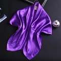 Close-up of elegant purple satin square scarf showing smooth texture and luxury silk-like shine - Light Purple