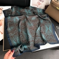 Detail of teal and brown paisley pattern silk scarf on elegant flat lay background - 70x70cm / Teal Brown Paisley (FJ887-5)