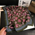 Detail of dark green paisley silk scarf with pink patterns on a luxury black tray - Dark Green Pink Paisley Style (FJ888-3)