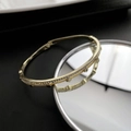 Verstelbare gouden armband met rijen zirkoniasteentjes en metalen noppenaccenten - Gouden klinknagel pavé armband (2-2#7)