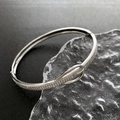 Silver snowflake bangle with pave-set zircon stones and unique belt-buckle hinge closure - Belt Buckle Bracelet (1-8#21) / Silver