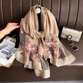 Detail of elegant champagne silk scarf with floral embroidery and mesh patchwork - Camel Pink Floral