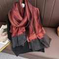 Detail of burgundy and black bicolor silk scarf showing translucent texture and soft luster - Cinnabar Black