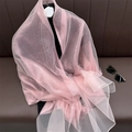 Detail of pink pearlescent silk scarf showing lightweight sheer fabric and soft texture - Princess Pink