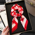 Close-up of red and white floral silk scarf tied in a bow inside a premium gift box - Red (FJ841-2)