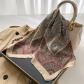 Retro paisley silk scarf in beige and green draped over a leather luxury handbag - 70x70cm / Champagne (FJ777-1)