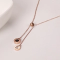 Collana a Y in oro rosa con numeri romani, doppio ciondolo e catena regolabile - Oro rosa