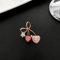 Elegant rose gold cherry brooch with red heart crystals and sparkling bow detail - Pink Heart Zircon Brooch