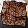 Detailed view of luxury square silk scarf featuring brown geometric pattern and border - Black Brown (FJ833-2)