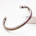 Detail of silver stainless steel C-shaped cuff with rainbow chain inlay and magnetic ends - Silver Bangle with Multicolor Chain