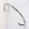 Bracciale rigido in acciaio argento con simbolo dell'infinito e incisione motivazionale - Colore Acciaio (Incisione Always Believe In Yourself)