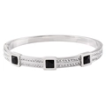 Macro detail of silver titanium steel bangle with square black stones and pavé set crystals - Steel Black Zirconia