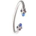 Silver twisted cable cuff bracelet featuring blue and purple gemstone end caps - Steel Color / Blue Bead