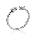 Silver stainless steel cable bangle with detailed dragon heads in a bold open design - Steel