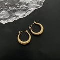Chic golden hoop earrings with snake scale texture on a sleek black background - Gold (Snake Scale)