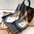 Detail of houndstooth silk scarf draped on a handbag with French vintage illustrations - Blue and Orange Splicing Houndstooth Vintage Illustration (FJ733-4)
