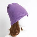 Minimalist purple ribbed knit beanie for winter warmth on a white model mannequin - One Size / Purple