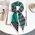 Detail of emerald green and houndstooth silk scarf on a book for a chic lifestyle look - Emerald Patchwork Houndstooth Geometric (LE-263)
