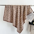 Detail of printed silk scarf with geometric pattern draped over a stylish beige blazer - 90x90cm / Khaki (FN169-3)