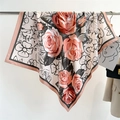 Detail of elegant 90cm square silk scarf featuring orange roses and pink borders - 90x90cm / Light Pink