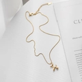 Collana chic in titanio dorato con ciondolo a forma di cane palloncino e catena regolabile - Cane Palloncino Oro (03-H11)
