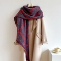Macro view of thick checkered scarf with vintage plaid pattern and raw edge details - 250x42cm / Red