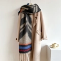 Detail of grey and beige thick scarf with herringbone patterns and long fringe tassels - Black and Gray