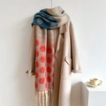 Detailed close-up of thick winter scarf with colorful polka dots and fringe accents - Orange-Blue (WT109-5)