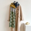 Close-up of thick knit scarf with large colorful polka dots and cream woven tassels - Green (WT109-7)