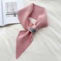 Pink knit cross-through scarf with grey stripes on a soft white textured background - Pink
