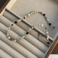 Detail of handcrafted clavicle necklace with strawberry quartz and natural gemstones - Agate Black Bead Vintage Style (01-A6)