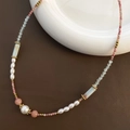 Detail of beaded necklace featuring strawberry quartz, pearls, and blue gemstones - Pink Mineral and Sky Blue Faceted Bead Style (3-M21)
