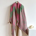 Thick pink and green leopard print knit scarf with fringe on a beige coat - Pink and Green