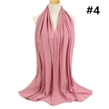 Detail of pink chiffon hijab showing soft fabric texture and elegant drape on a mannequin - 174x68cm / Pink (TH9-4)