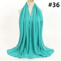 Detail view of the mint green chiffon hijab showing light texture and drape on a mannequin - 174x68cm / Teal Green (TH9-36)