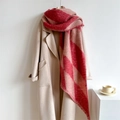 Detailed close-up of thick checkered scarf in red and pink with soft fringe edges - 250x42cm / Red